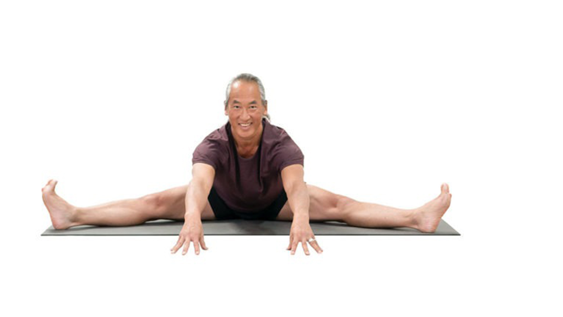 Yoga Gaia et Méditation : l'instructeur de yoga Rodney Yee exécute une pose à grand angle assis